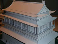 a white drum tower with roofs, whose edges are as sharp as knives
