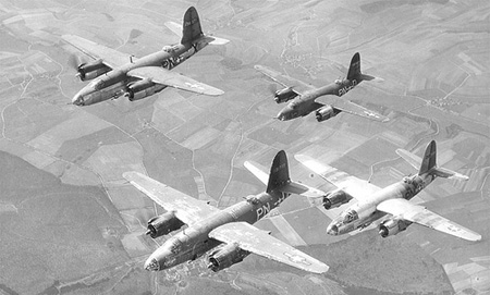 Four B-26's in the three basic paint schemes